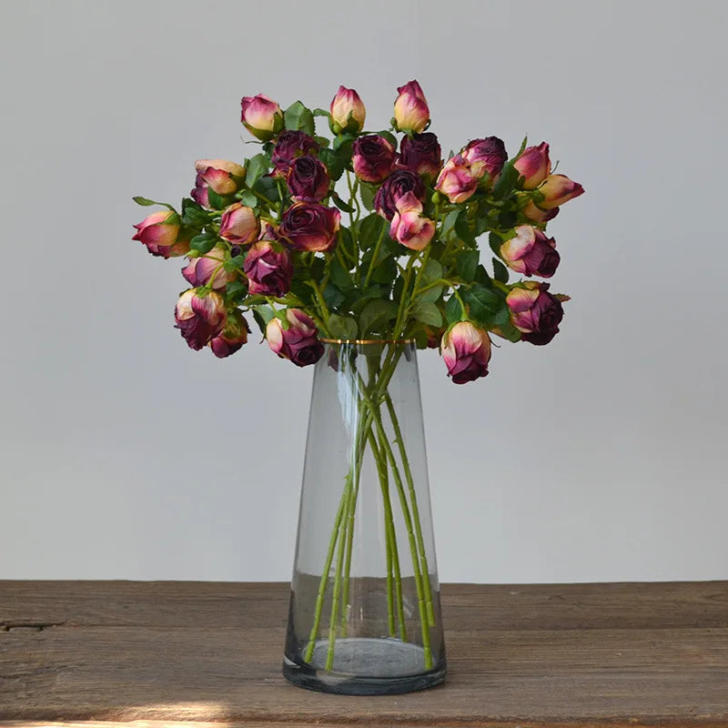 Flores artificiais em tons de outono com bordas roxo, ideais para decoração sofisticada e aconchegante